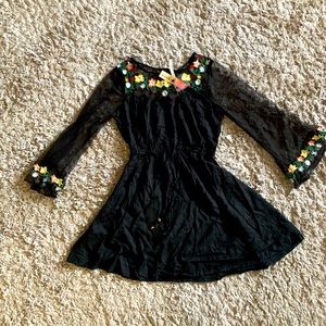 Cute dress. See through arms. Black . Sz M but fits S. New